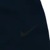 Pantalón deportivo Nike Dri-FIT azul marino, con corte ajustado y logo de la marca en la pierna izquierda.