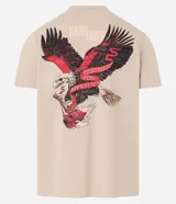 Remera de algodón color beige, corte comfort, con cuello redondo y manga corta. Presenta un gran estampado trasero de un águila con alas abiertas, sosteniendo una cinta roja con el texto "DESTRUCTION FOR APPETITE" y el logo de Guns N' Roses en la parte superior.