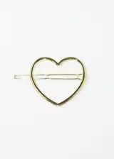 Broche para el pelo dorado con forma de corazón.