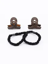 Set de dos broches tipo pinza para el pelo y dos coleros elásticos negros.