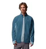 Campera polar con cierre frontal completo, cuello alto y mangas largas con orificios para pulgares. Presenta un diseño en dos tonos de azul con paneles laterales en un tono más claro y logo de la marca bordado en el pecho.