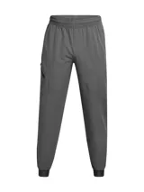Pantalón de jogging Under Armour modelo Unstoppable Wvn de color gris, con bolsillos laterales con cierre y diseño deportivo.