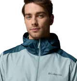 Campera cortavientos Columbia Flashback II en color celeste con capucha y detalles en azul oscuro en hombros y laterales. Cuenta con cierre frontal completo y bolsillos laterales.