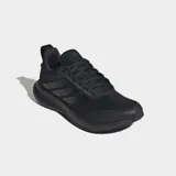 Championes de running Adidas Runfalcon 5, completamente negros, con exterior de malla textil y sintética, forro interno de tela y suela Adiwear. Cuentan con mediasuela Cloudfoam y plantilla OrthoLite®.