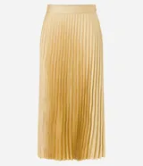 Falda midi plisada color dorado, de crepé satinado, con cierre lateral.