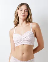 Bralette de encaje floral color rosa pálido, con breteles finos regulables, sin aro ni relleno, con forro interno de microtul elastizado y cierre trasero de tres posiciones.