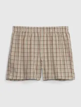 Calzoncillo tipo boxer de corte clásico con estampado de cuadros en tonos beige y marrón. Presenta una cintura elástica cómoda y bragueta frontal.
