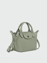 Bolso tipo tote Longchamp Le Pliage Xtra, color amarillo, con doble asa superior y cierre de solapa con botón a presión.