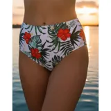 Bikini de dos piezas modelo Brenda, compuesto por un top deportivo liso color amarillo y una bombacha de tiro alto con estampado tropical de flores rojas y hojas verdes sobre fondo amarillo.