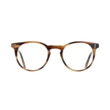 Lentes de receta con armazón de eco acetato en tono carey con acabado veteado y diseño redondeado.
