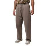 Pantalon de jogging Nike Jordan modelo Brooklyn Fleece, color marron topo, con cintura elastizada, cordones ajustables, bolsillos laterales y logo Jumpman bordado en negro.