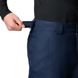 Pantalón de esquí Columbia modelo Bugaboo V, color azul marino, con tecnología impermeable y transpirable Omni-Tech y forro térmico reflectante Omni-Heat. Cuenta con cintura ajustable, bolsillos con cierre, polainas internas y refuerzos en la parte inferior de la pierna.