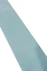 Corbata verde oscuro con estampado floral y pañuelo de bolsillo a juego.