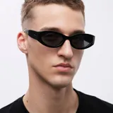 Lentes de sol negros con montura ovalada de acetato y lentes polarizadas alemanas con protección UV400.