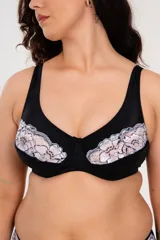 Soutien blanco con aro, confeccionado con tela que contiene fibra LYCRA® y puntilla elastizada bicolor con diseño floral. Breteles anchos regulables.