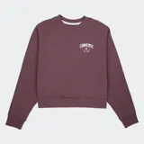 Buzo Converse Retro Chuck Classic Crew color marrón, con cuello redondo y elástico acanalado en puños y cintura. Estampado frontal con el logo "Converse All Star" en blanco.