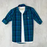 Camisa de manga larga a cuadros turquesa, azul y negro, de algodón.