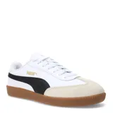 Championes urbanos Puma modelo 9T W, de diseño clásico con base de goma color caramelo, puntera de gamuza en tono beige y cuerpo blanco con la icónica franja lateral en negro.