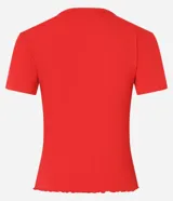 Blusa básica de manga corta y cuello redondo, confeccionada en viscosa texturizada de canalé con elastano y detalle de terminación ondulada en el bajo.