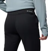 Pantalon de trekking Columbia para hombre, confeccionado en forro polar de rejilla con tecnología Omni-Wick que absorbe la humedad. Presenta un corte ajustado, cintura ajustable, bolsillos laterales y bolsillo posterior con cierre.
