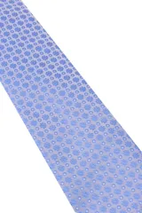 Corbata verde oscuro con estampado floral y pañuelo de bolsillo a juego.