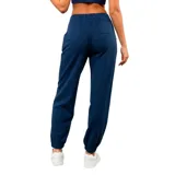 Pantalon de jogging Umbro color azul marino, con cintura elástica ajustable mediante cordón, puños elásticos en los tobillos y bolsillos laterales. Presenta el escudo del Club Nacional de Football y el logo de la marca bordados en la parte frontal.