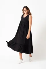 Vestido midi negro de algodón con escote en V y corte imperio.