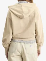 Campera con capucha y cierre frontal, confeccionada en algodón con acabado teñido en prenda. Presenta un corte holgado, hombros caídos, puños acanalados y etiqueta cuadrada tejida con el logo de la marca en el pecho.