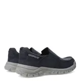 Zapatos tipo slip-on de la marca Caterpillar, confeccionados en lona de color azul marino. Presentan un diseño de estilo casual con costuras reforzadas en la puntera, elásticos laterales para un calce fácil y una suela de goma robusta en color gris con el logo de la marca en el lateral.