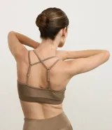 Top deportivo Get Over confeccionado en microfibra con efecto satinado, color marrón, con diseño de tirantes dobles y escote en V.