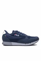 Championes deportivos Fila modelo Jogger Sport II, color azul marino, con suela gris y blanca, y detalles de la marca bordados en el lateral.