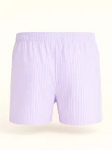 Bóxer de algodón blanco con estampado de flores pequeñas color celeste, con cintura elástica y logo de la marca en el centro.