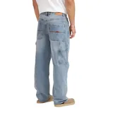 Jeans Quiksilver modelo Nilo para hombre, de corte amplio y relajado, color azul medio con efecto lavado.