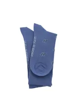 Medias de largo medio color azul con estampado de monograma gris, con tecnología de puño suave.