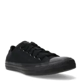 Championes Converse All Star de corte bajo, color negro monocromático, confeccionados en lona de algodón con suela de goma vulcanizada y cierre mediante cordones.