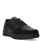 Championes urbanos de estilo retro, color negro, con diseño de paneles en cuero sintético y gamuza. Presentan perforaciones en la puntera para mayor ventilación, cordones al tono y suela de goma resistente.