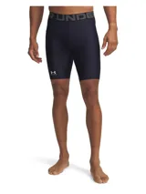 Calza corta deportiva Under Armour HeatGear de compresión en color azul marino, con cintura elástica ancha con logo impreso y bolsillo lateral.