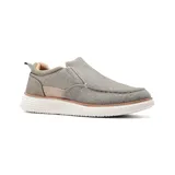 Zapato casual gris sin cordones, con elástico en los laterales y suela blanca.