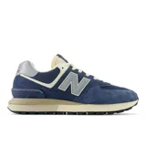 Championes urbanos New Balance modelo 574, color azul con detalles en gris y beige, confeccionados en gamuza y malla, con logo "N" característico en los laterales y entresuela ENCAP.