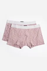 Pack de dos boxers para hombre, uno azul con estampado de dinosaurios y otro azul marino con estampado de símbolos.