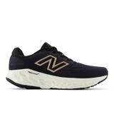 Championes de running New Balance Evoz V4 para mujer, color azul marino con detalles en negro y logo en color cobre.
