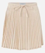 Short pollera deportivo de microfibra color beige, con diseño plisado y cintura elastizada con cordón regulable.
