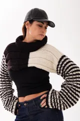 Gorra estilo baseball confeccionada en cuero negro, con diseño clásico de seis paneles y visera curva. Cuenta con sistema de ajuste posterior.