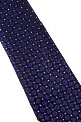 Corbata verde oscuro con estampado floral y pañuelo de bolsillo a juego.