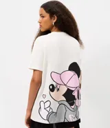Remera oversized de algodón blanco, con mangas cortas, cuello redondo y gran estampado frontal de Minnie Mouse.
