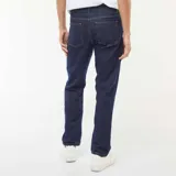 Pantalón de jean azul oscuro, corte slim, tiro medio y confeccionado en Francia.