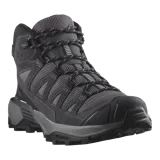 Calzado de trekking Salomon modelo X Ultra 360 Leather Mid Gore-Tex, de corte alto, color marrón y tostado con detalles en verde. Confeccionado con cuero resistente, malla y membrana impermeable Gore-Tex.