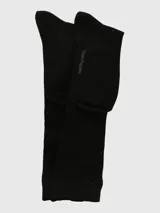 Calcetín largo de caña alta, diseñado especialmente para usar con botas, confeccionado en tejido de bambú con textura acanalada.