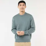 Sweater de punto de cuello redondo con puños y ruedo acanalados, de diseño clásico y corte estándar.