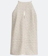 Blusa musculosa con cuello halter y estampado geométrico.